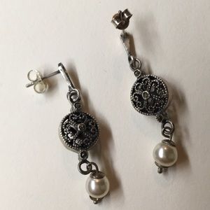 Dangling pearl earrings